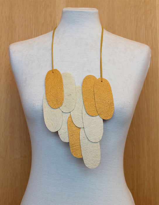 Pieces Assymmetrical M - Gold Mineral & White Pinatex